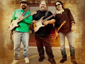 Texas Scratch (from left to right: Vince Converse, Buddy Whittington, Jim Suhler)