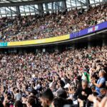people at the bleachers of the stadium Cheering crowd at rugby world cup 2019 (Photo by Stefan Lehner on Unsplash)