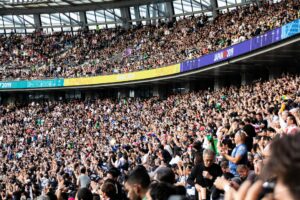 people at the bleachers of the stadium Cheering crowd at rugby world cup 2019 (Photo by Stefan Lehner on Unsplash)