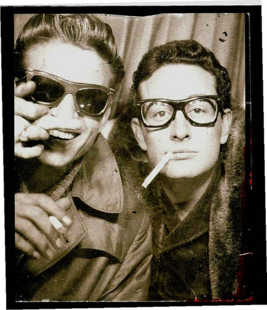 Buddy Holly and Waylon Jennings photographed in a photo-booth in Central Station, in New York City on January 23, 1959