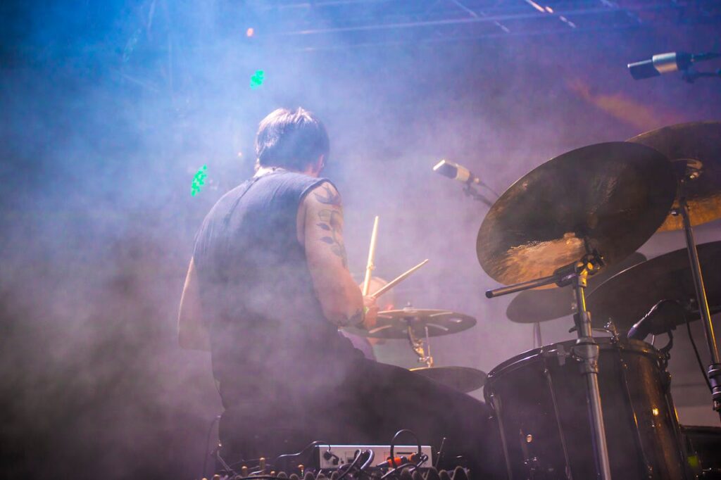 Photo by Mantas Hesthaven: https://www.pexels.com/photo/performing-drummer-surrounded-by-fogs-354304/