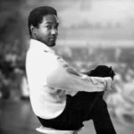 Sam Cooke - adapted from public domain photo from ad for single When A Boy Falls In Love / The Piper, released 1965.