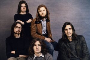 Genesis publicity photo, colourised, 1971: Steve Hackett, Peter Gabriel, Tony Banks, Phil Collins, Mike Rutherford