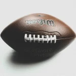 Close-up of a Wilson NFL football against a white backdrop (Dhia Eddine, Pexels, free)